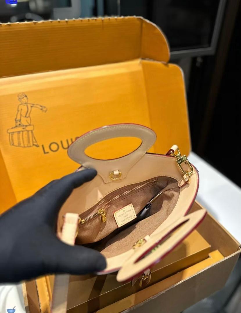 Interior view of Louis Vuitton women’s mini handbag