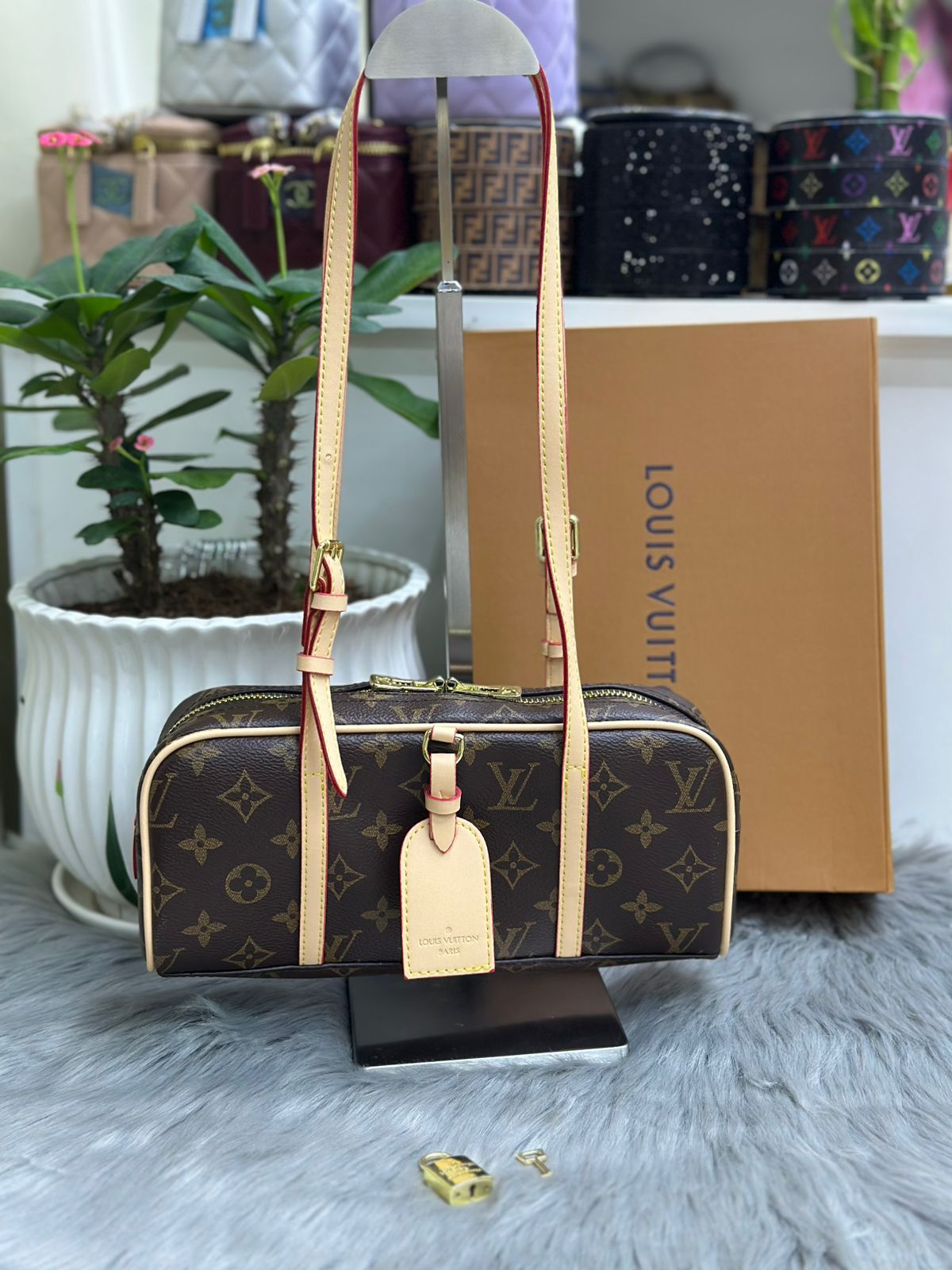 Louis Vuitton brown monogram canvas shoulder barrel handbag