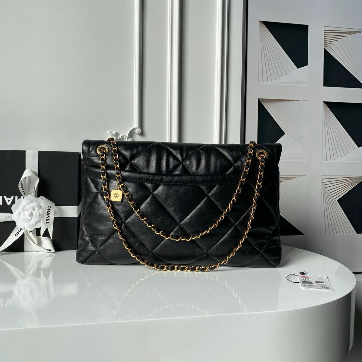 Classic black diamond quilted leather flap shoulder bag with gold turn lock clasp