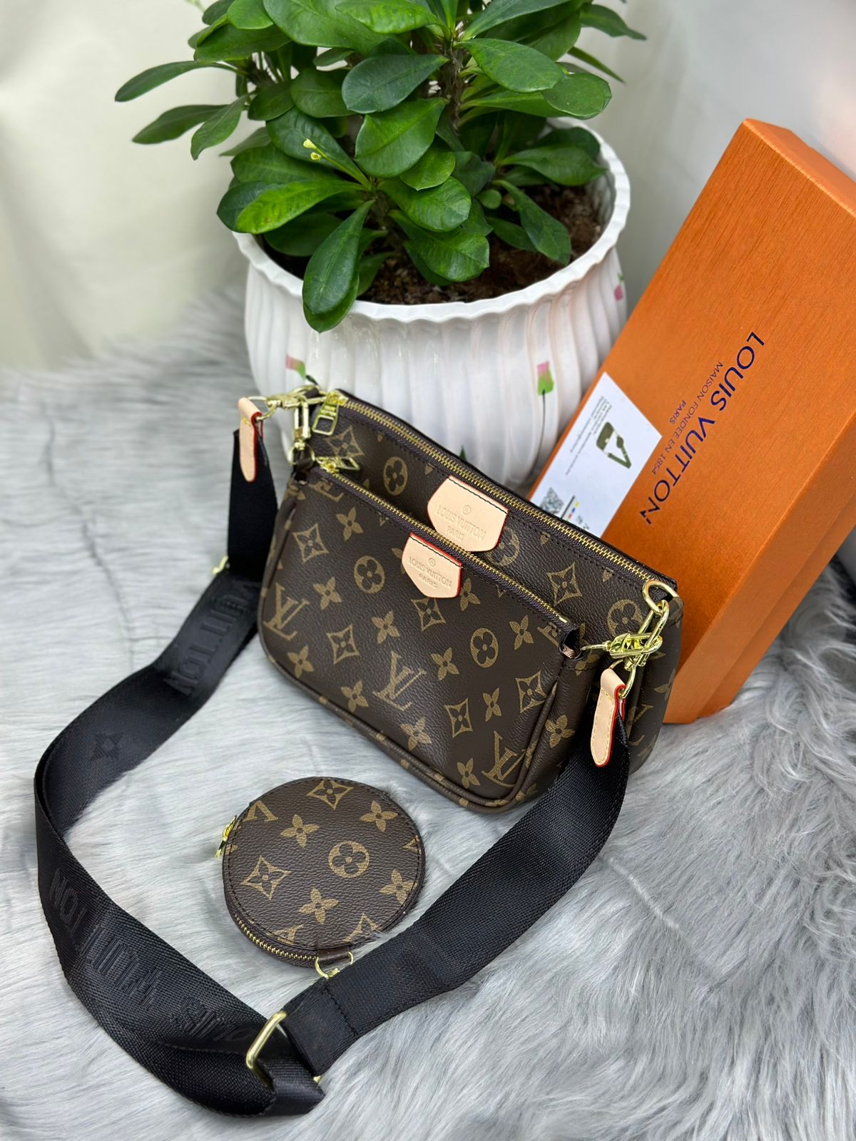 Louis Vuitton Monogram Multi Pochette 3-in-1 bag with black shoulder strap