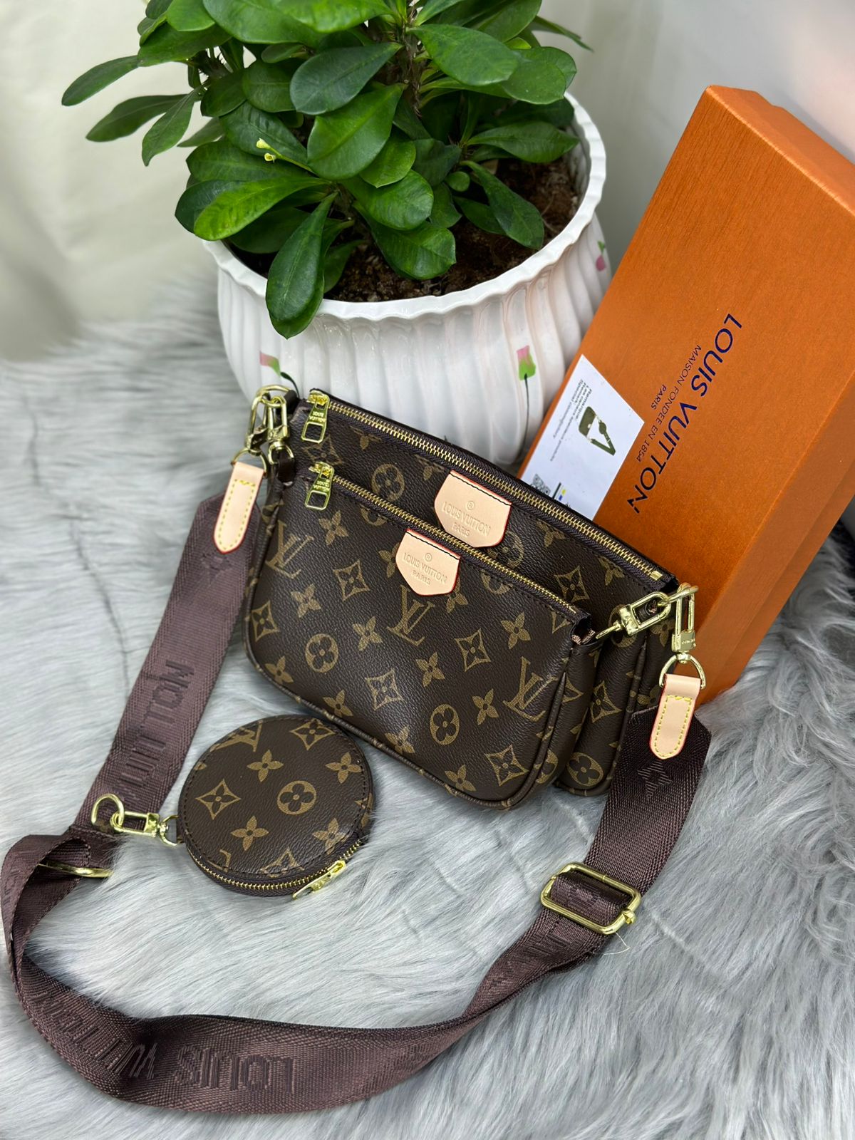 Louis Vuitton Monogram Multi Pochette crossbody bag with brown woven strap