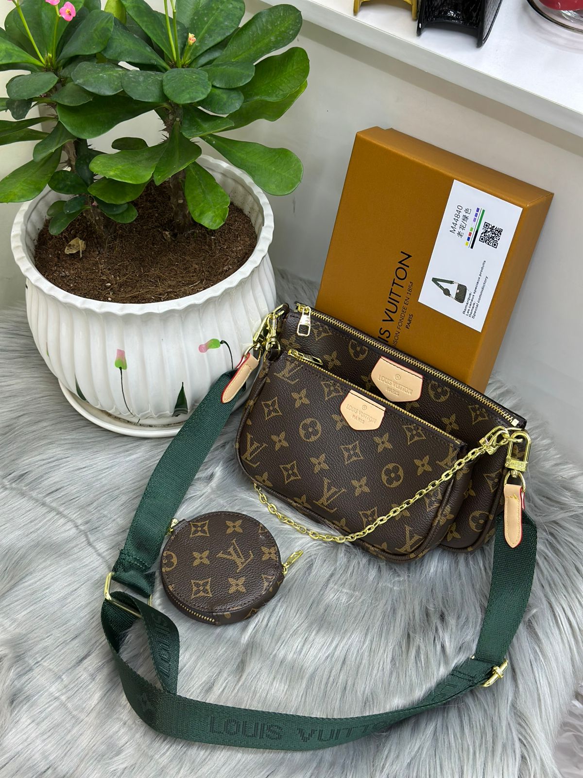 Louis Vuitton Monogram Multi Pochette 3-in-1 bag with green strap and coin purse