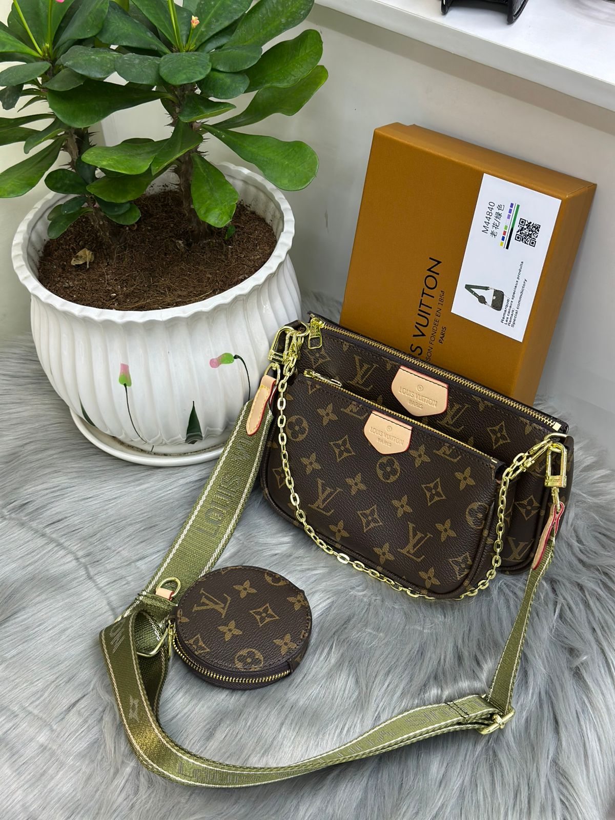 Louis Vuitton Monogram Multi Pochette bag with olive green shoulder strap