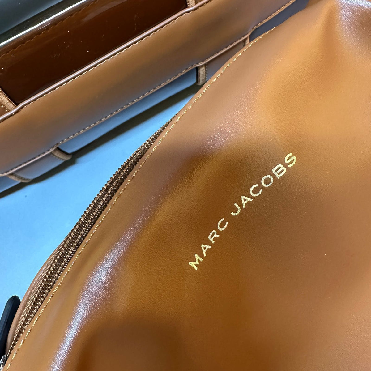 Marc Jacobs The Tote Bag logo detailing close view