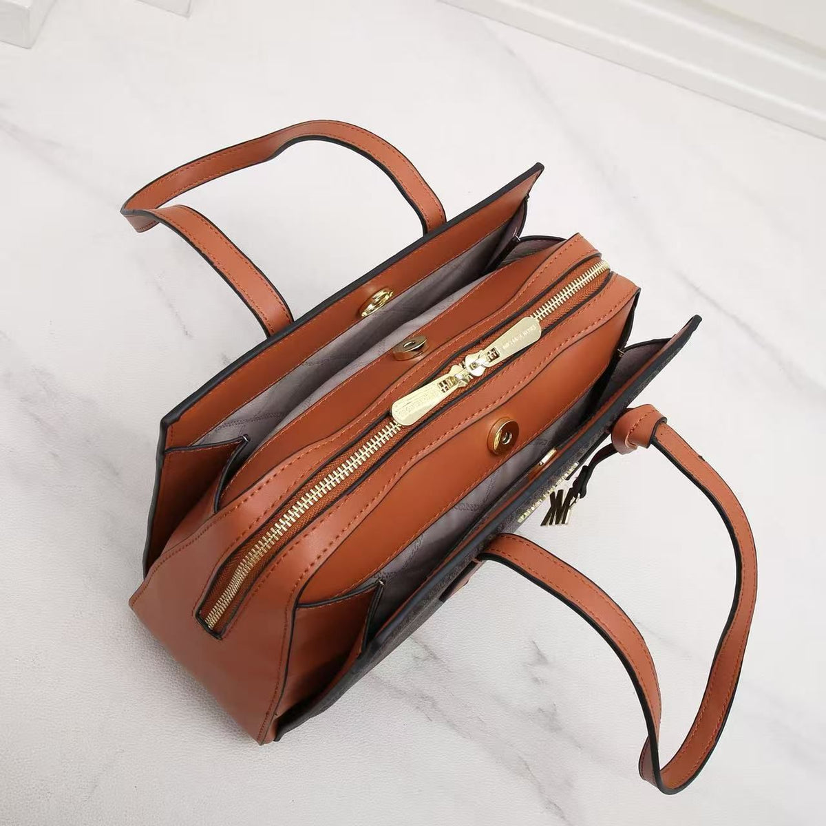 Michael Kors tote bag open design and handle detail