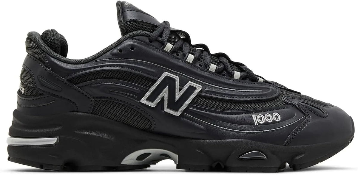 Side profile of New Balance 1000 black sneaker