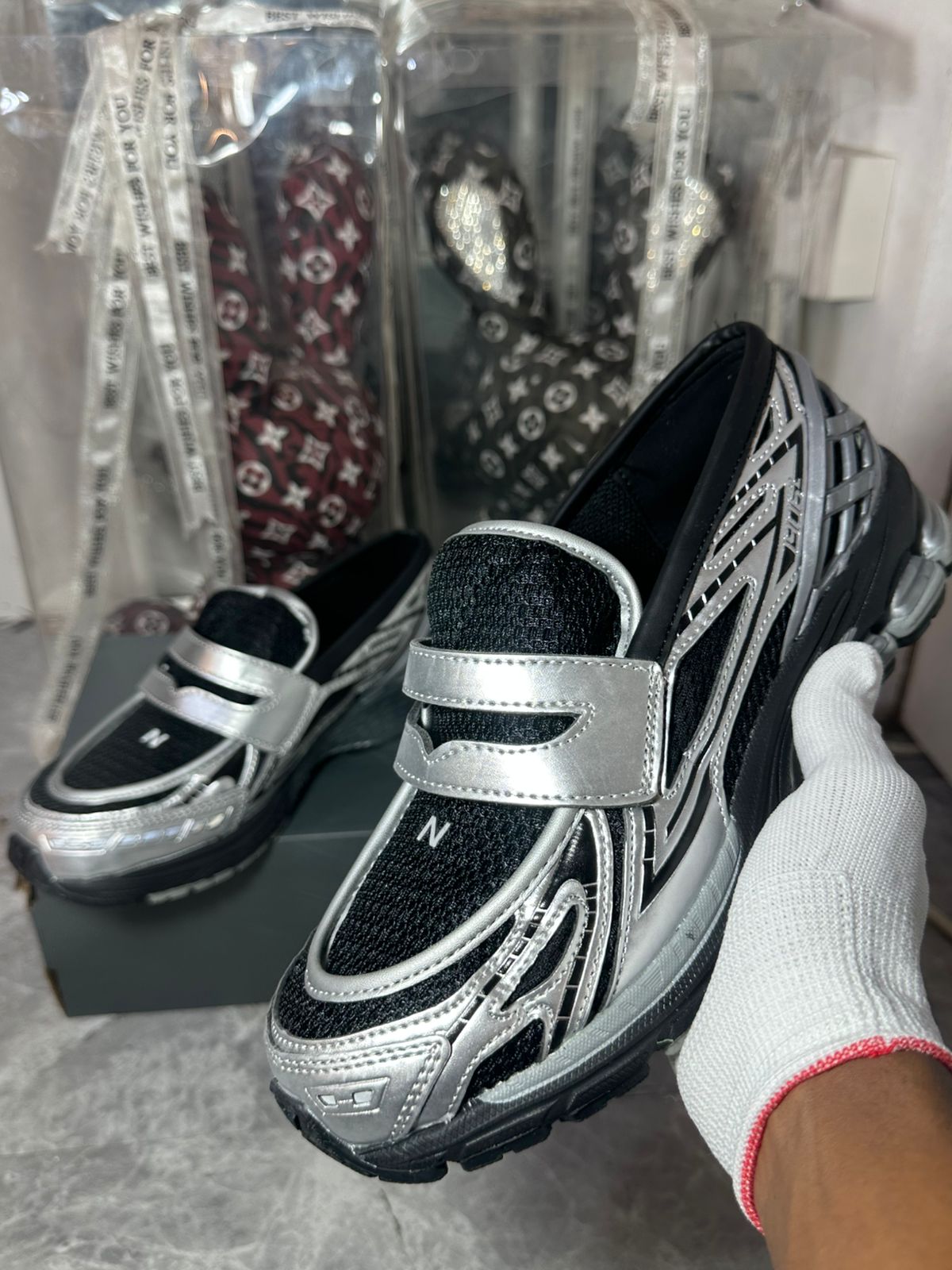 New Balance 1906L silver black slip on sneakers at Aone Brands Dubai