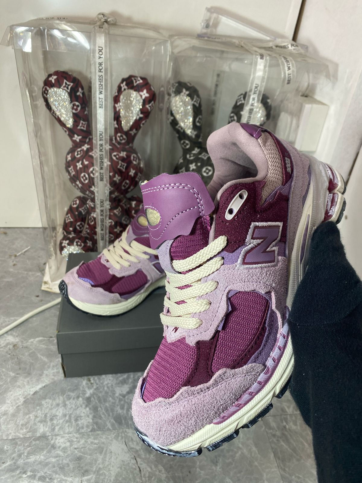 New Balance 2002R pink purple sneakers at Aone Brands Dubai