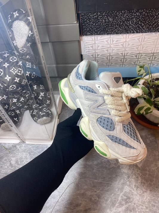 New Balance 9060 cream grey and green sneakers at Aone Brands Dubai
