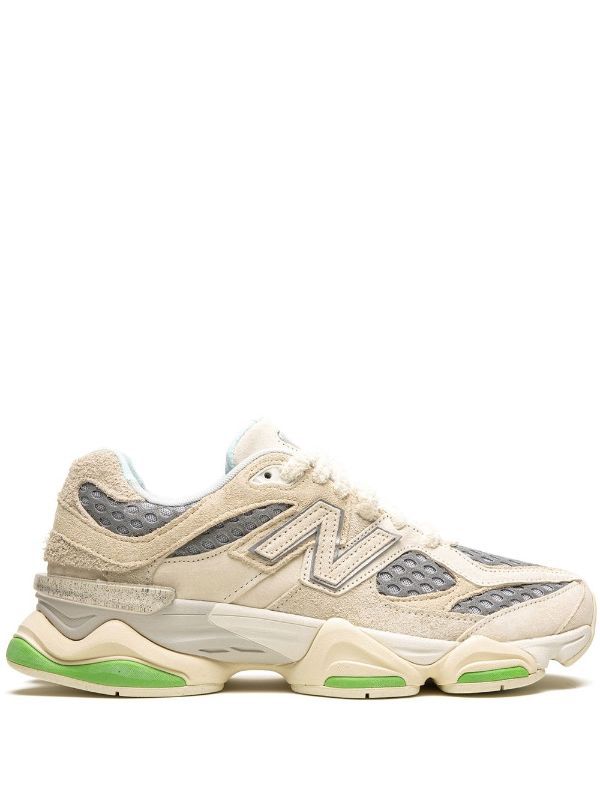 Side profile of New Balance 9060 cream grey sneaker
