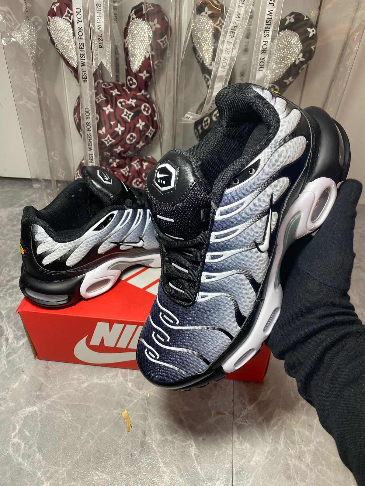 Nike Air Max Plus black grey sneakers at Aone Brands Dubai