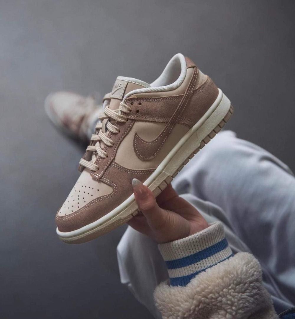 Nike Dunk Low beige cream sneakers lifestyle view
