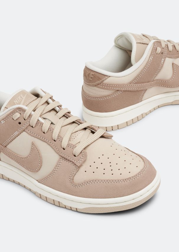 Nike Dunk Low beige and cream sneakers pair view