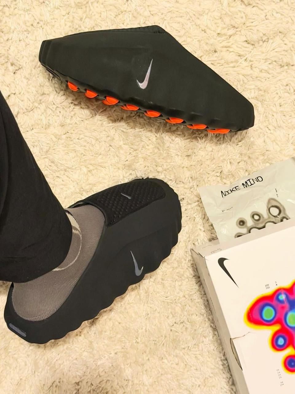 Nike Mind 001 Black Hyper Crimson mules at Aone Brands Dubai