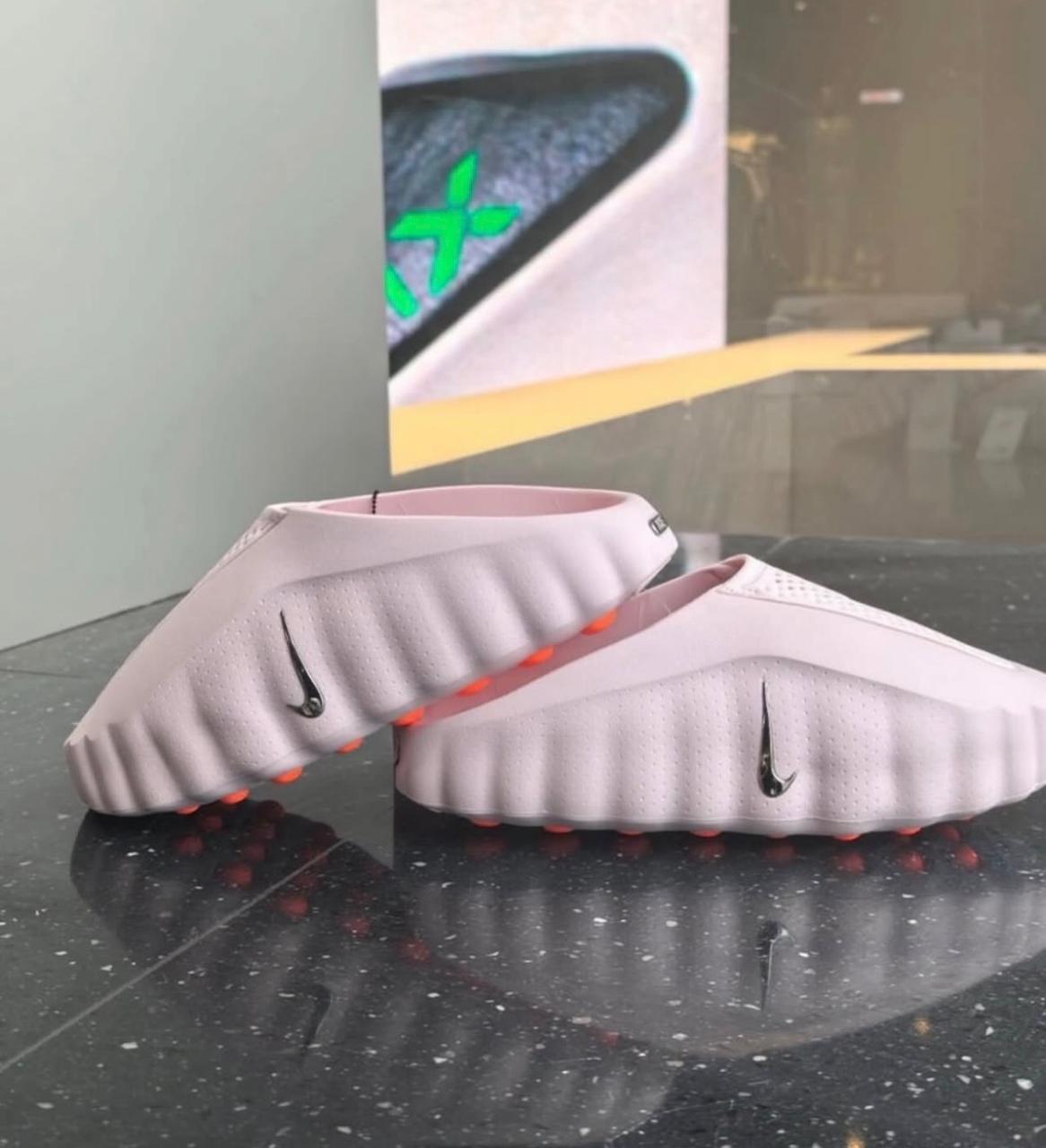 Nike Mind 001 Pearl Pink Hyper Crimson mules at Aone Brands Dubai
