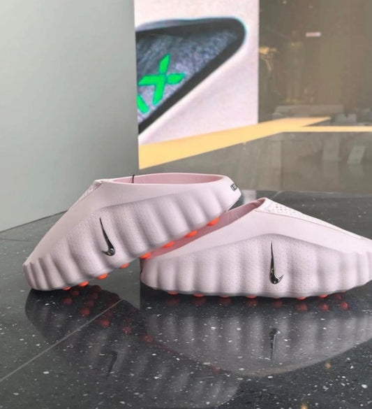 Nike Mind 001 Pearl Pink Hyper Crimson mules at Aone Brands Dubai