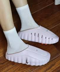 Nike Mind 001 Pink Smoke women's mules on feet