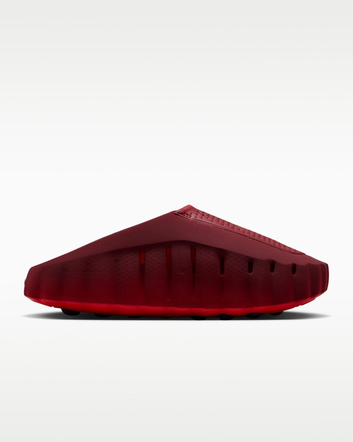 Side view of Nike Mind 001 Solar Red mule