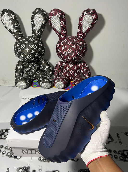 Nike Mind 001 men’s pregame mules in Blackened Blue and Game Royal