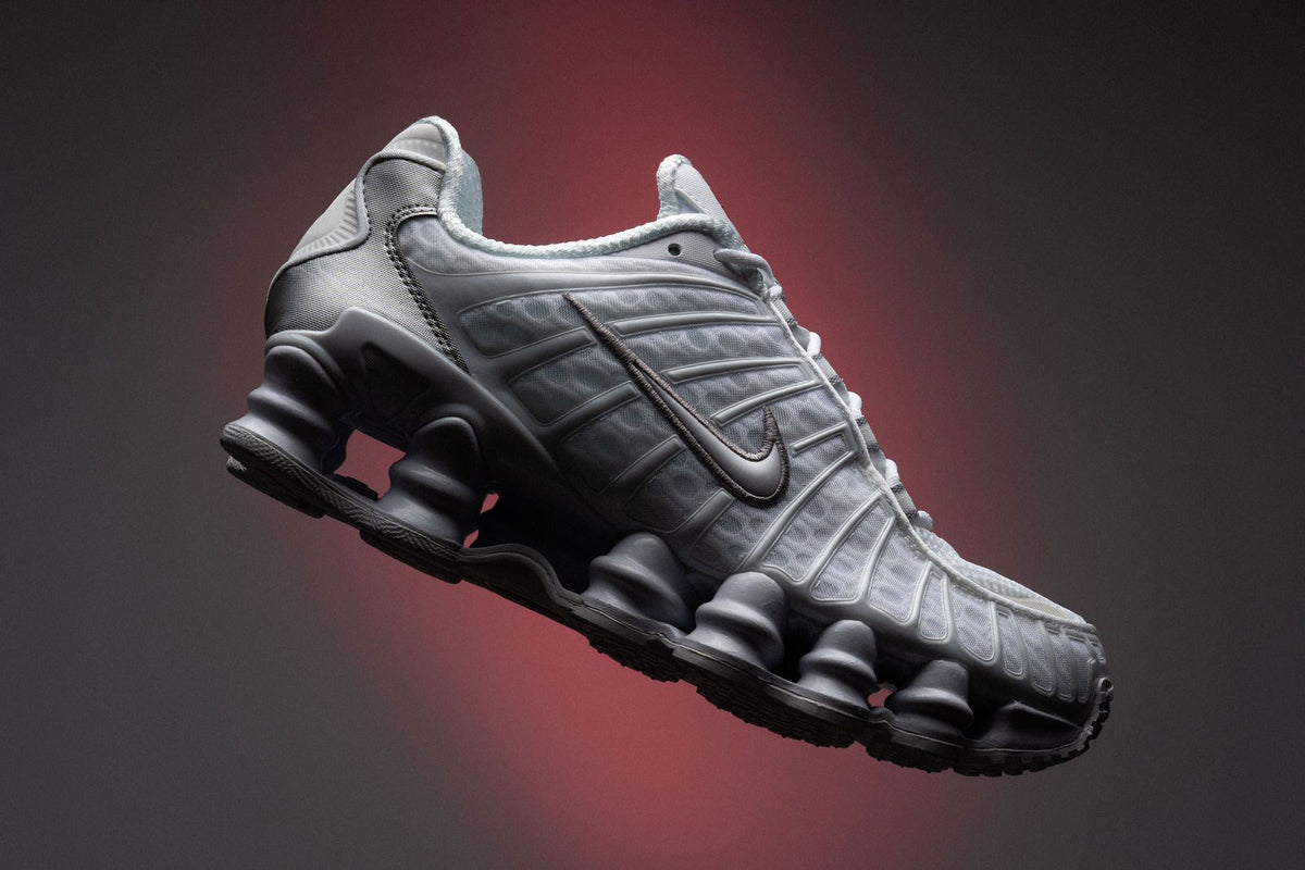 Side view of Nike Shox TL White Silver and Max Orange shoe