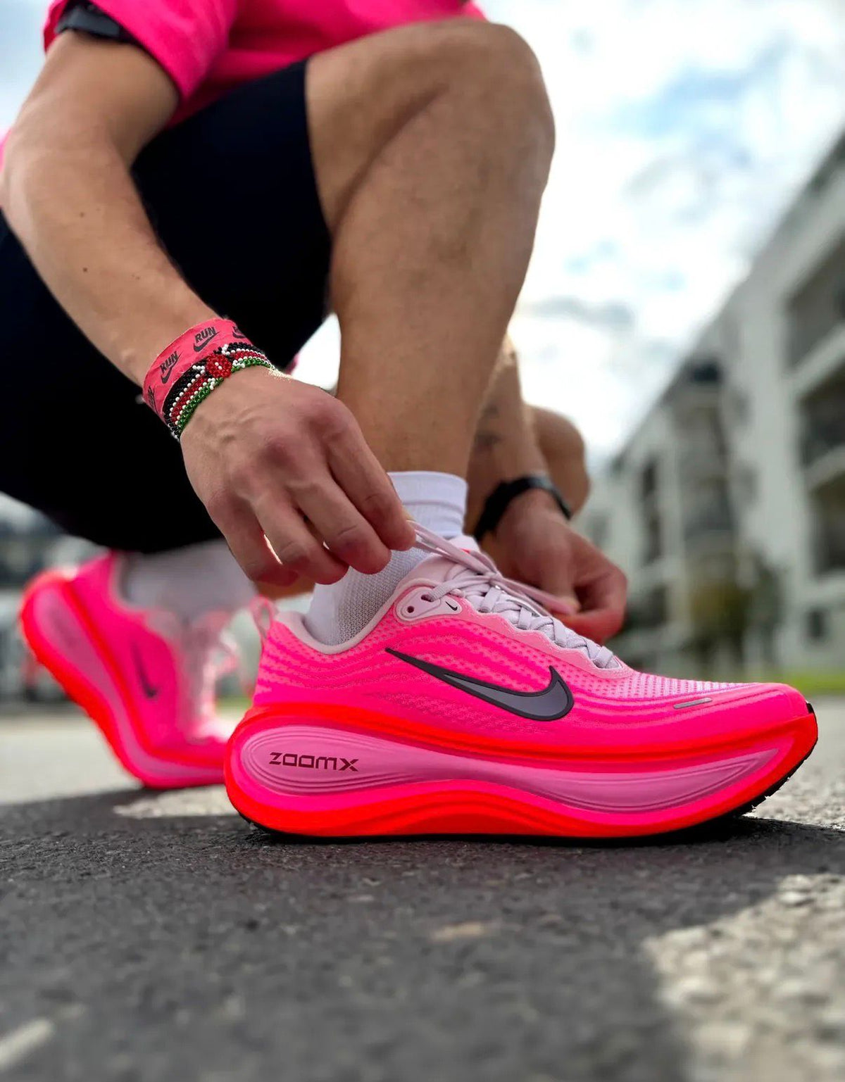 Nike Vomero Premium University Red Hyper Pink sneakers at Aone Brands Dubai