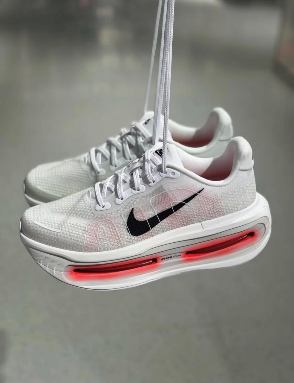 Nike Vomero Premium White Bright Crimson running sneakers pair view
