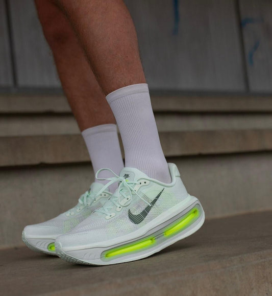 Nike Vomero Premium White Green Spark sneakers at Aone Brands Dubai