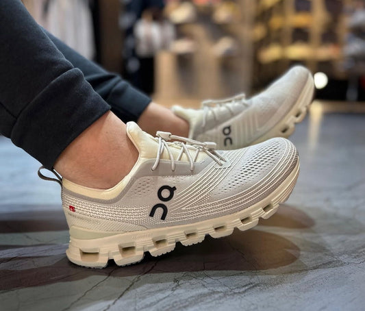 Women wearing On Cloud 6 Sand Sand sneakers