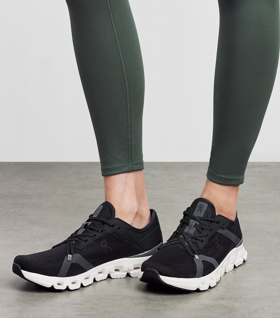 Black On Cloud athletic sneakers shown on foot