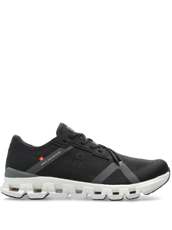 Side profile of black and grey On Cloud sneaker