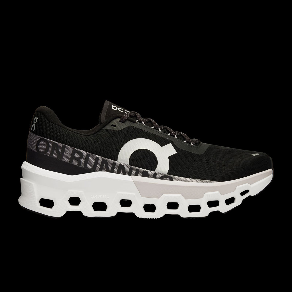 Side profile of black and white On Cloud sneaker