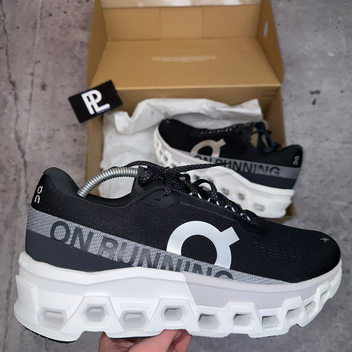 On Cloud black and white chunky sneakers in UAE