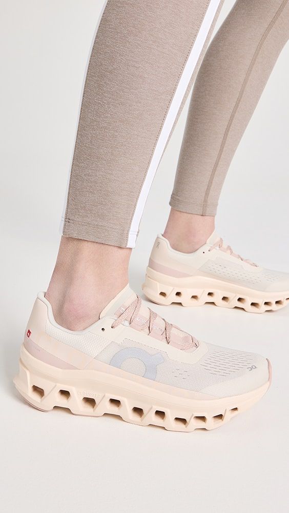 Side view of On Cloudmonster 2 Cream and Horizon shoe