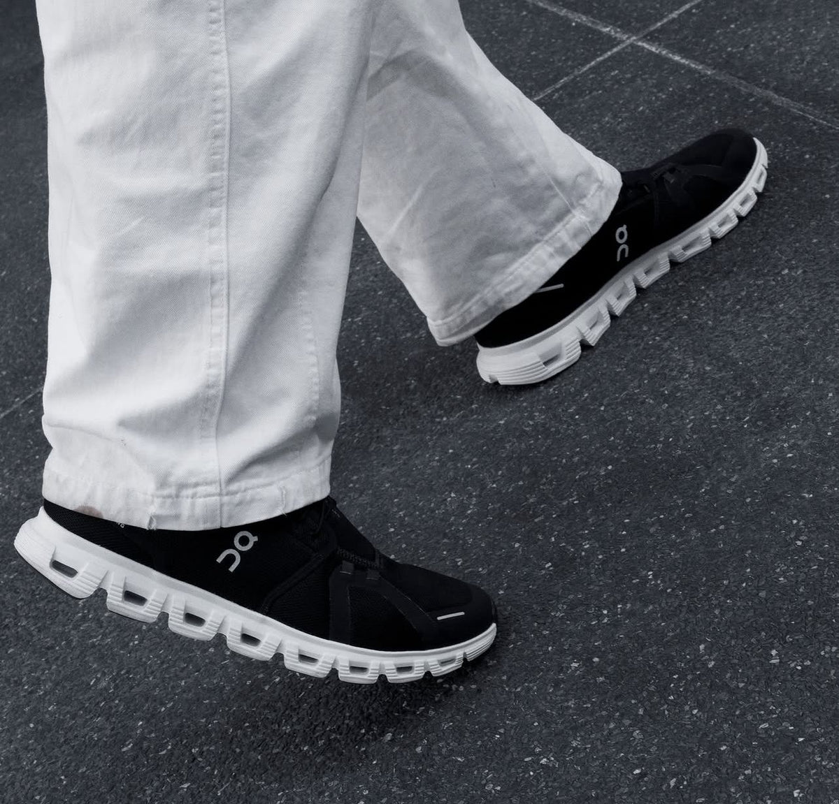 On Cloudmonster All Black men’s shoes on feet