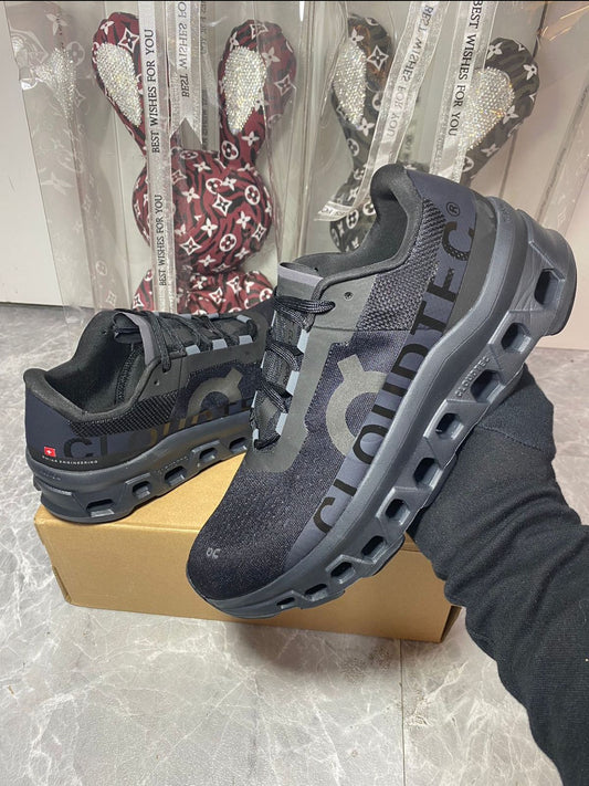 On Cloudmonster black and grey running shoes in UAE