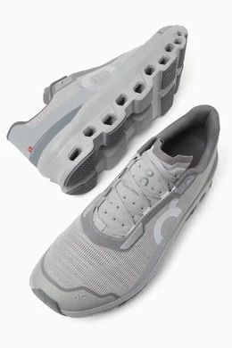 Angled view of On Cloudmonster Void grey sneakers