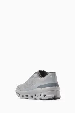 On Cloudmonster Void grey men’s sneakers worn on feet