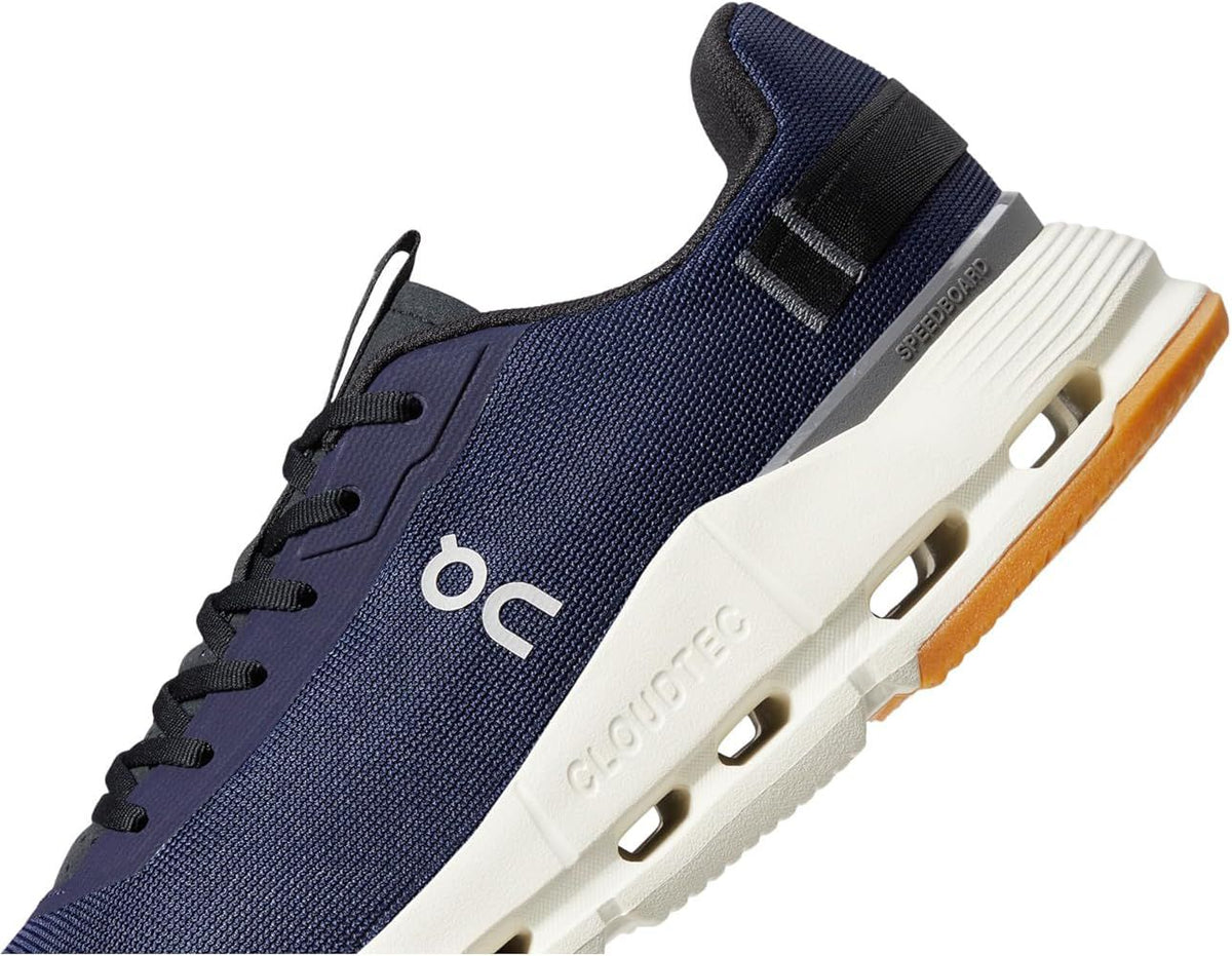 Close-up of navy On Cloudnova sneaker with white sole