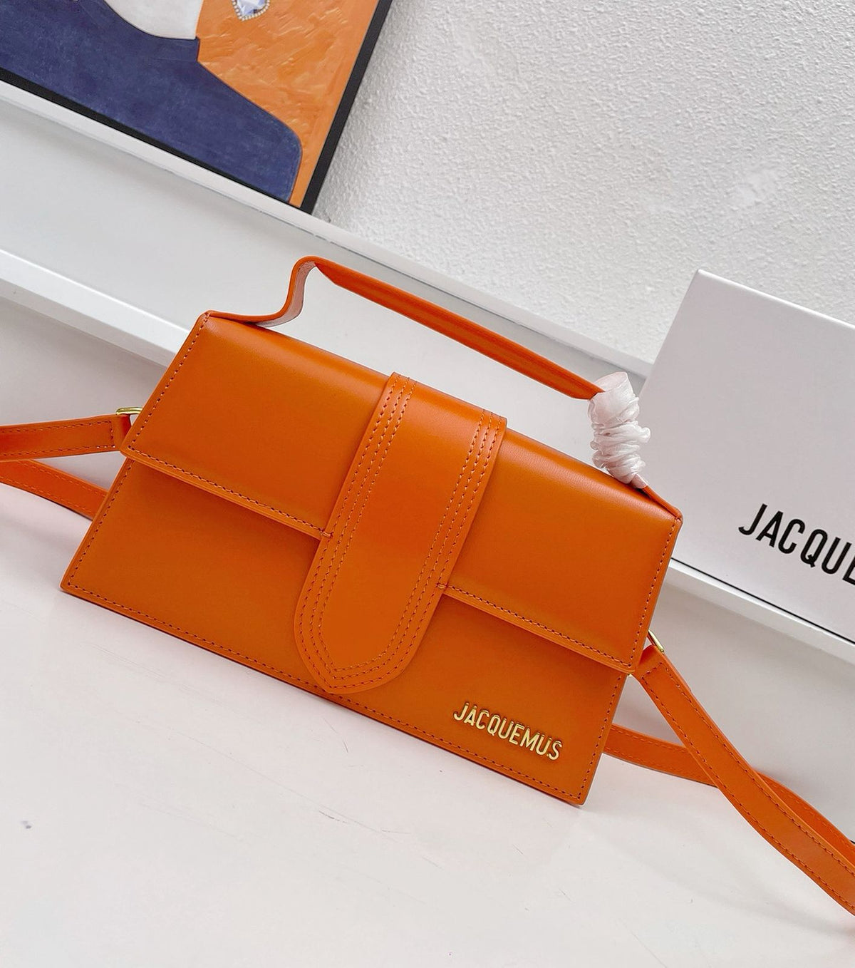 Orange mini shoulder bag for women with modern design