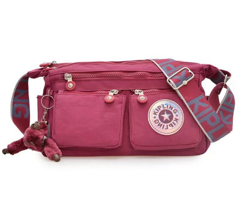 Red Kipling style casual handbag for women