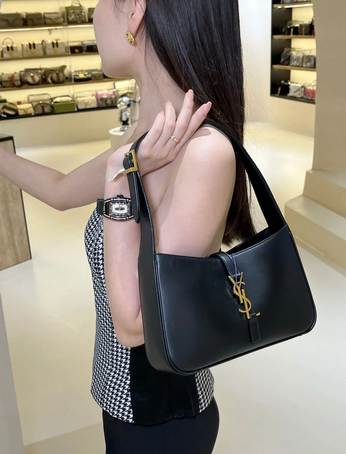 Saint Laurent Le 5 A 7 black women's shoulder bag on shoulder