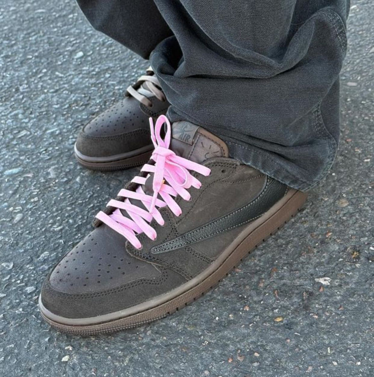 Travis Scott Jordan 1 Low sneakers shown on foot
