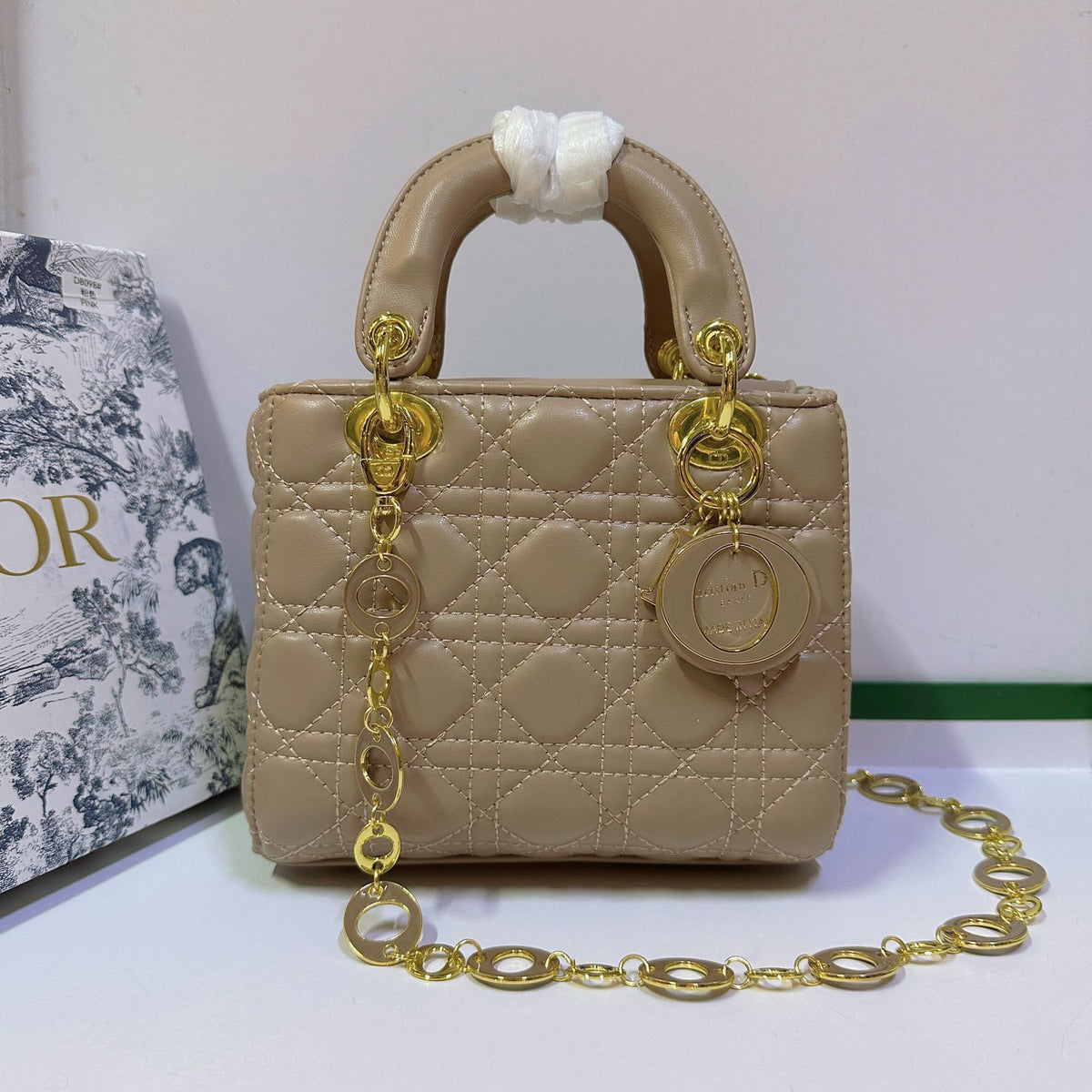 White quilted women's handbag with elegant design
