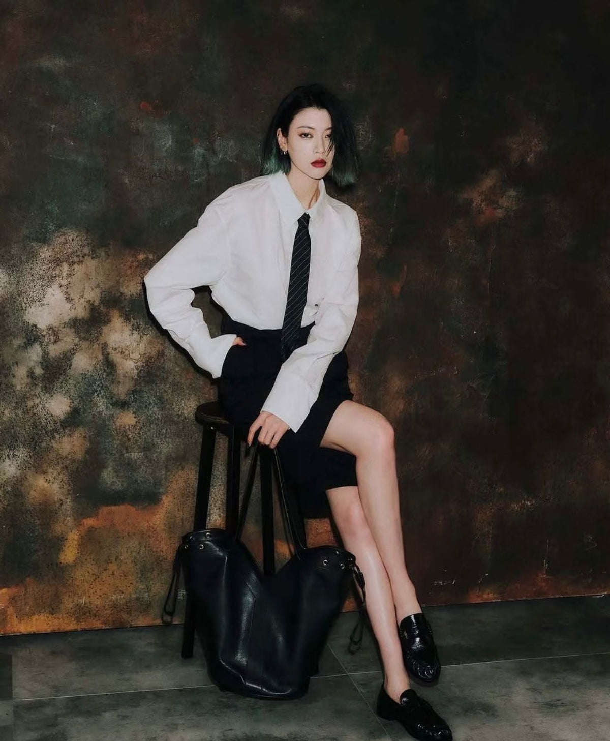 YSL mpdel tote bag with elegant shoulder handle design