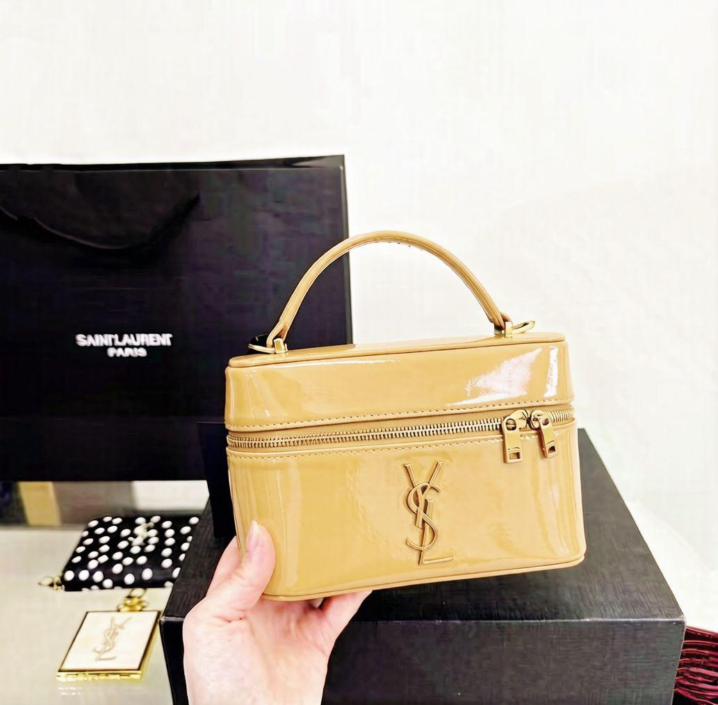 White YSL leather vanity top handle bag with gold hardware
